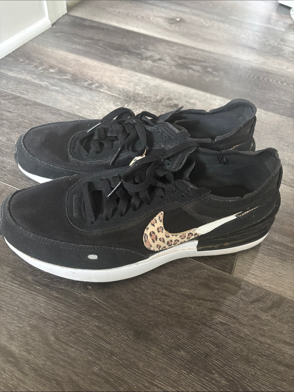 Nike Black Lace-Up Sneakers with Leopard Swoosh